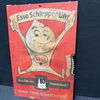 Esso Schlepper-Uhr (Pappschild mit Metallzahnrad)