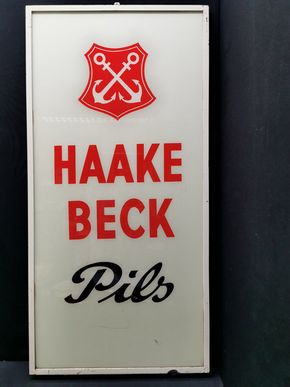 Haake Beck Glaswerbeschild im Rahmen (50er Jahre) - Variante 2 mit S im Schreibschriftstil