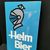 Helm Bier - Emailleschild mit ungewöhnlich tiefer Abkantung (Um 1955)