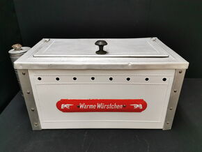 Warme Würstchen - Emaillierter „Bauchladen“ (Um 1910)