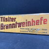 Ostdeutsche Hefewerke Tilsit - Tilsiter Branntweinhefte (Blechschild um 1950) BCM
