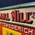 Carl Nill’s Spitzenwegerich Brustbonbons (Geprägtes Blechschild um 1905)