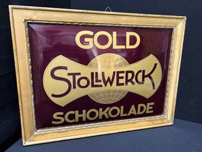 Stollwerck - Gold Schokolade / Gewölbtes Imoglasschild im Originalrahmen (Um 1915)