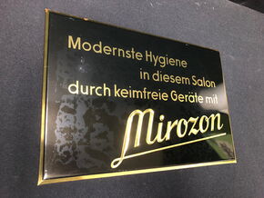 Mirozon - Geräte für den Frisörsalon. Blechschild um 1950. Ca. 20 x 30 cm (A8)