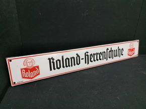 Roland Herrenschuhe - Abgekanteter Emaille-Türstreifen mit dem Bremer Wahrzeichen (Um 1930)