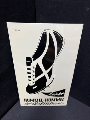 Hummel Sportartikel - Blechwerbeschild mit Aufstellfunktion (Um 1950)