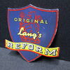 Langs Reform - Flaches Blechtürschild in Wappenform (1930/1950) A19