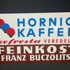 Hornig Kaffee - Feinkost Franz Buczolits (2er-Set großer Kunststoffschilder)