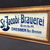 St. Jacobi-Brauerei G.m.b.H Drebber - Glasschild im Originalrahmen. (Um 1915)