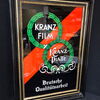 Kranz Film - Kranz Platte (Hinterglasschild im Originalrahmen) um 1920