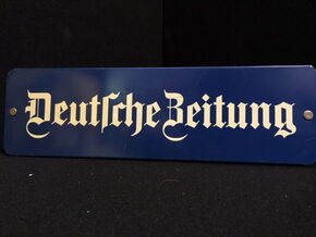 Briefbeschwerer Zeitungsklotz Zeitungsbeschwerer aus Blech " Deutsche Zeitung "