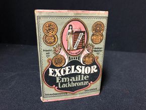Exelsior Emaille Lackbronze Originalverpackung (Um 1910)
